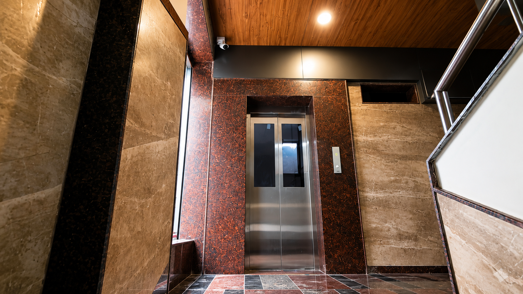 Marble and stainless-steel elevator lobby