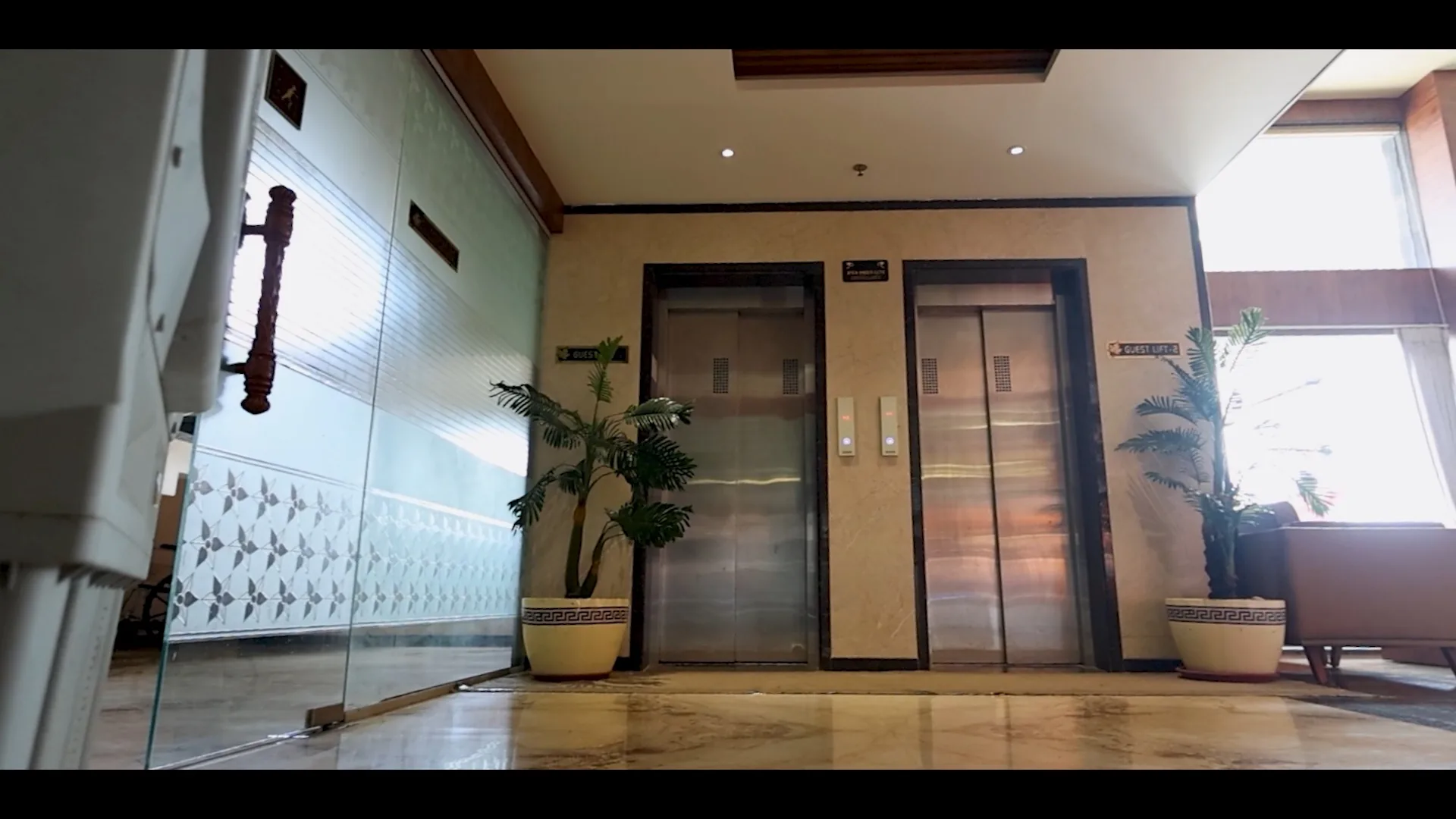 Modern hotel lobby with elevator